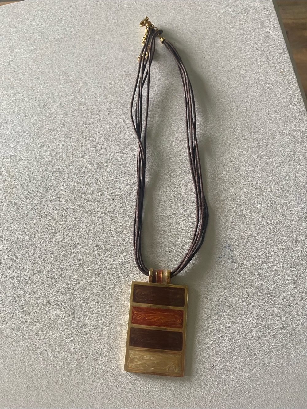 Multi-Strand Brown Cord Necklace with Rectangular Gold Pendant - Brown/Gold